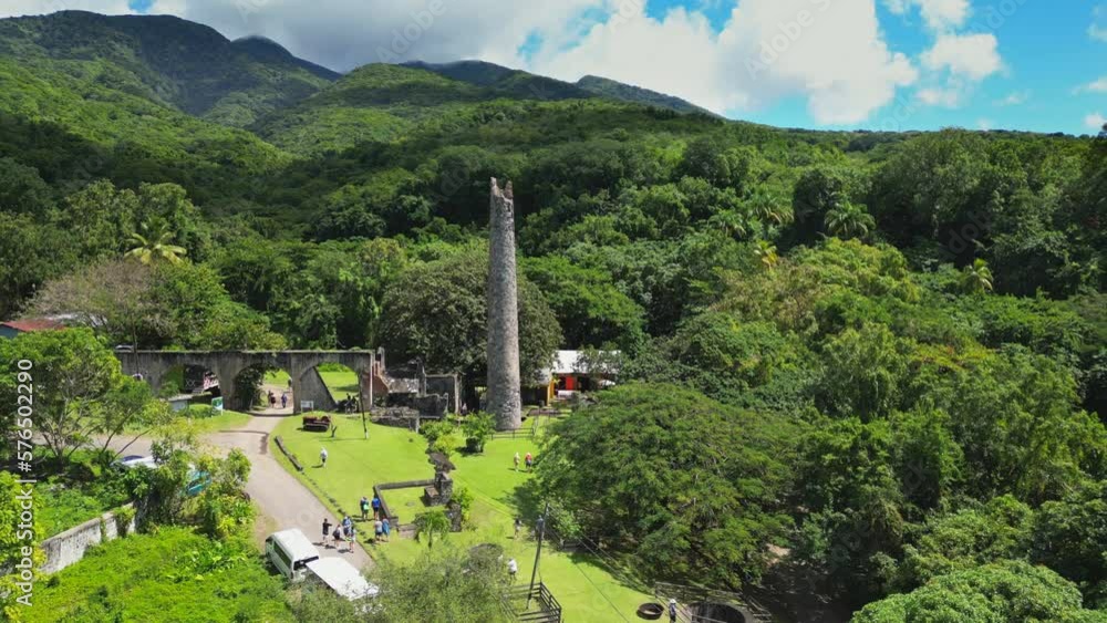 Flying past the old rum distillery on St Kitts island, over the jungle