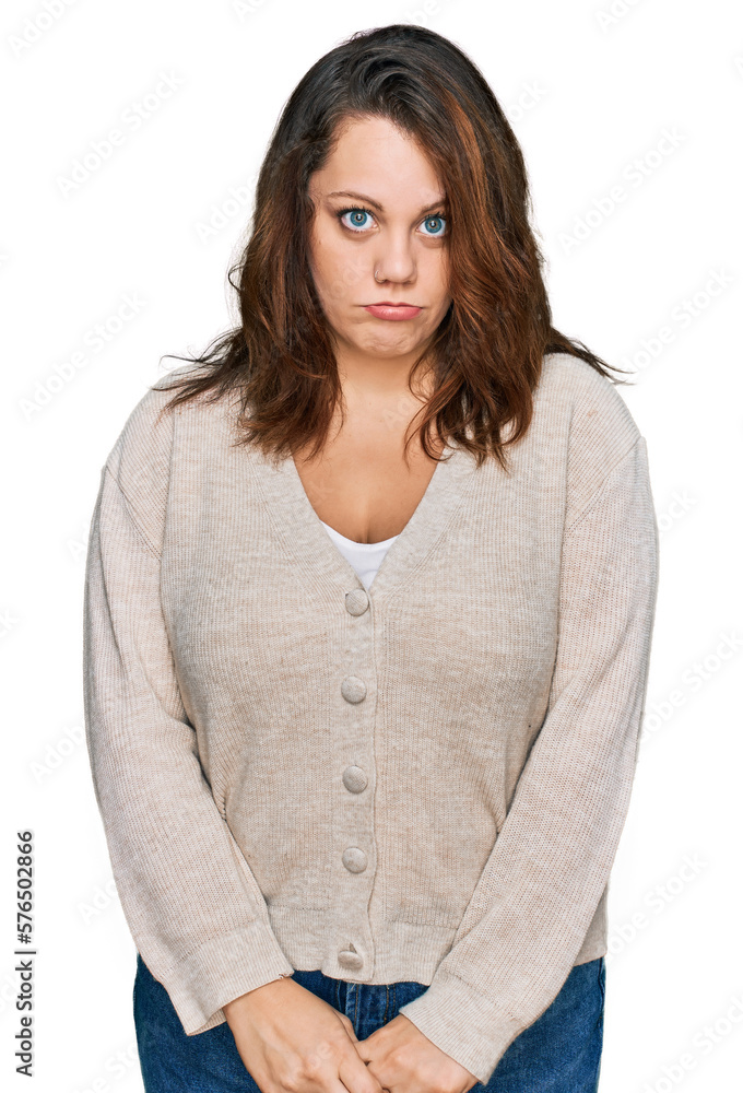 Young plus size woman wearing casual clothes depressed and worry for distress, crying angry and afraid. sad expression. Young plus size woman wearing casual clothes depressed and worry for distress, crying angry and afraid. sad expression.