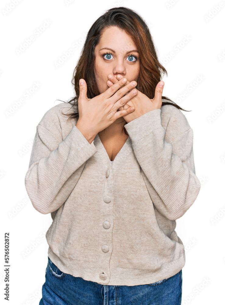 Young plus size woman wearing casual clothes shocked covering mouth with hands for mistake. secret concept. Young plus size woman wearing casual clothes shocked covering mouth with hands for mistake. secret concept.