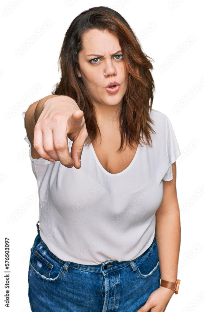 Young plus size woman wearing casual white t shirt pointing displeased and frustrated to the camera, angry and furious with you Young plus size woman wearing casual white t shirt pointing displeased and frustrated to the camera, angry and furious with you