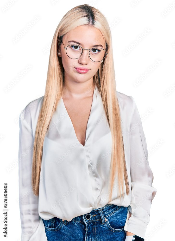 Beautiful blonde woman wearing elegant shirt and glasses looking sleepy and tired, exhausted for fatigue and hangover, lazy eyes in the morning. Beautiful blonde woman wearing elegant shirt and glasses looking sleepy and tired, exhausted for fatigue and hangover, lazy eyes in the morning.
