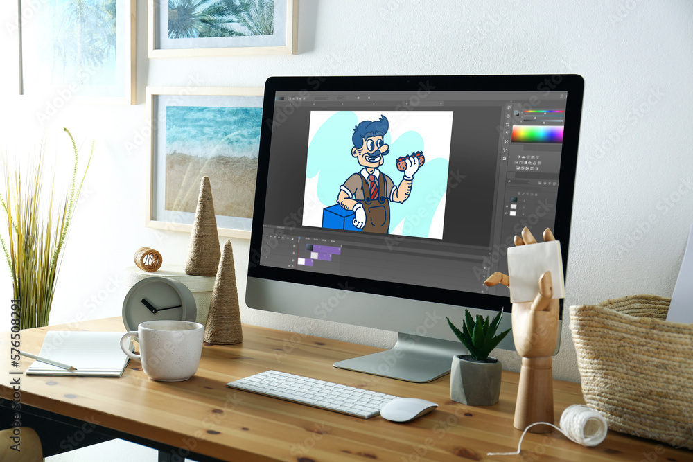 Animator's workplace. Modern computer with illustration on screen Animator's workplace. Modern computer with illustration on screen