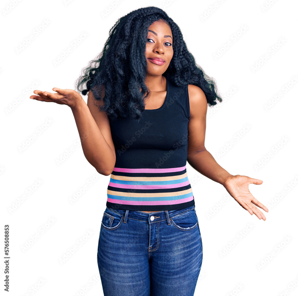 Beautiful african american woman wearing casual clothes clueless and confused expression with arms and hands raised. doubt concept. Beautiful african american woman wearing casual clothes clueless and confused expression with arms and hands raised. doubt concept.