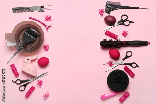 Canvas Print Frame made of hairdressing accessories, Easter eggs and flowers on pink backgrou