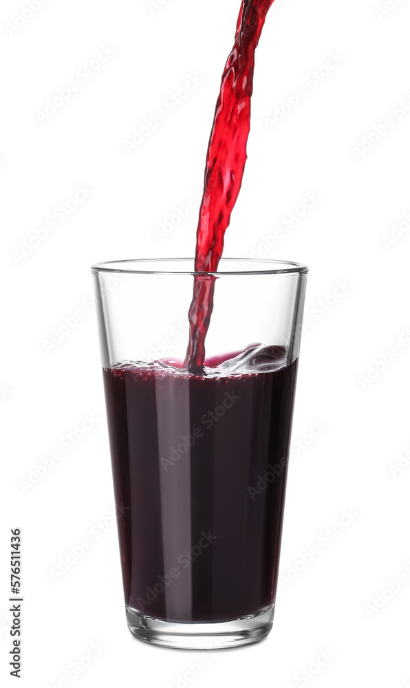 Pouring fresh juice into glass on white background Pouring fresh juice into glass on white background