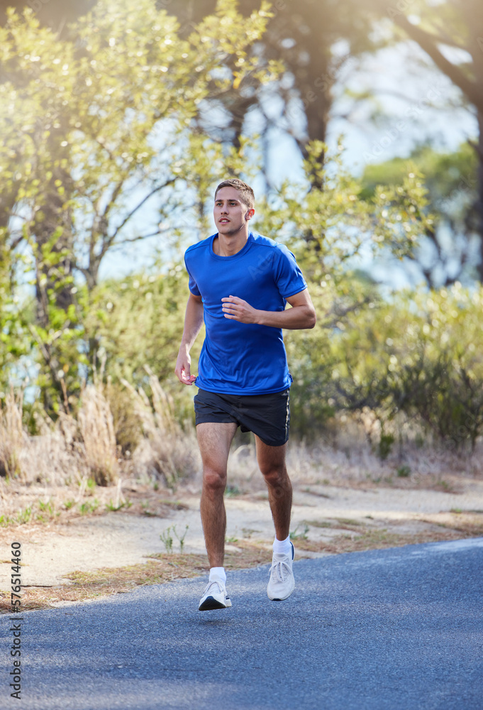 Athlete, running and man exercise in a road outdoors for health, wellness and fitness for energy or cardio strength. Runner, healthy and person training or workout in the street for a challenge Athlete, running and man exercise in a road outdoors for health, wellness and fitness for energy or cardio strength. Runner, healthy and person training or workout in the street for a challenge