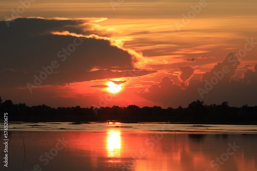 sunset over the river © ณดล นะ