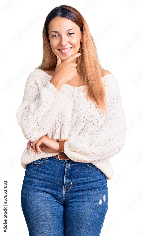 Beautiful young woman wearing casual clothes looking confident at the camera smiling with crossed arms and hand raised on chin. thinking positive. Beautiful young woman wearing casual clothes looking confident at the camera smiling with crossed arms and hand raised on chin. thinking positive.