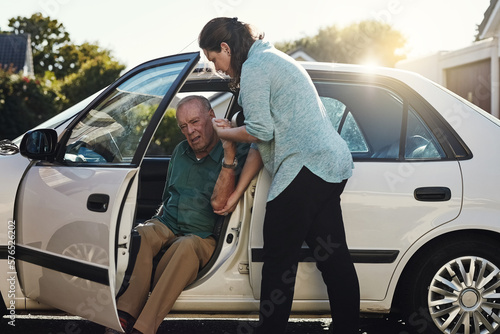 Ill be the support you need. Shot of a woman helping her senior father out the car. © Viglietti/peopleimages.com