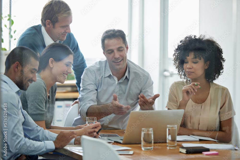 Brainstorming doesnt have to be boring. Shot of a group of professionals using wireless technology during a meeting. Brainstorming doesnt have to be boring. Shot of a group of professionals using wireless technology during a meeting.
