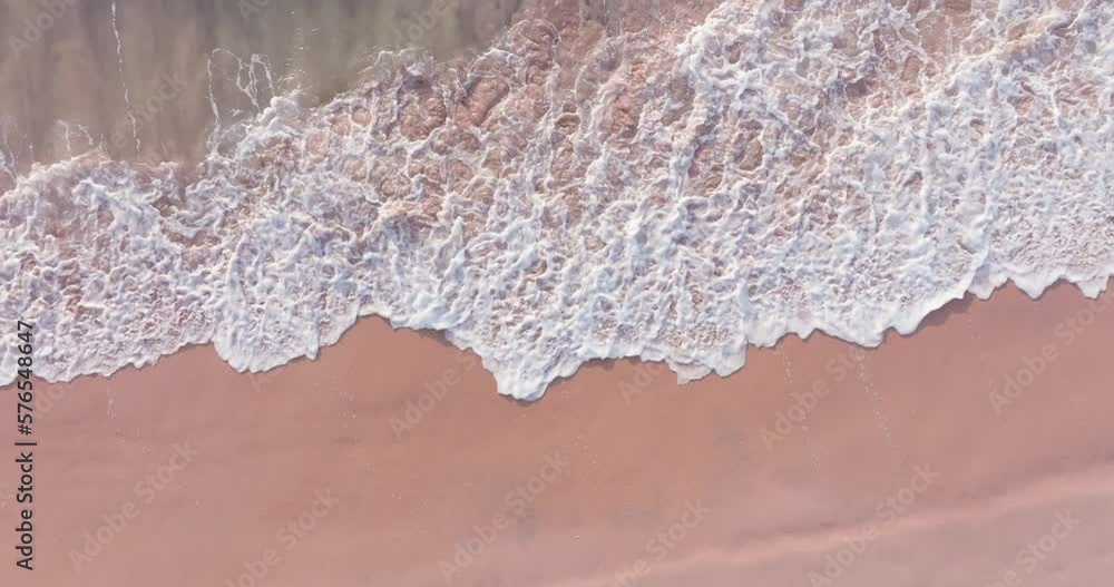 Aerial Drone flying over the beach, top down view.Top-view sea beach sand Wave sea water on sandy beach at sunset Aerial view drone camera high quality Tropical sea At Andaman sea South Thailand, Aerial Drone flying over the beach, top down view.Top-view sea beach sand Wave sea water on sandy beach at sunset Aerial view drone camera high quality Tropical sea At Andaman sea South Thailand,