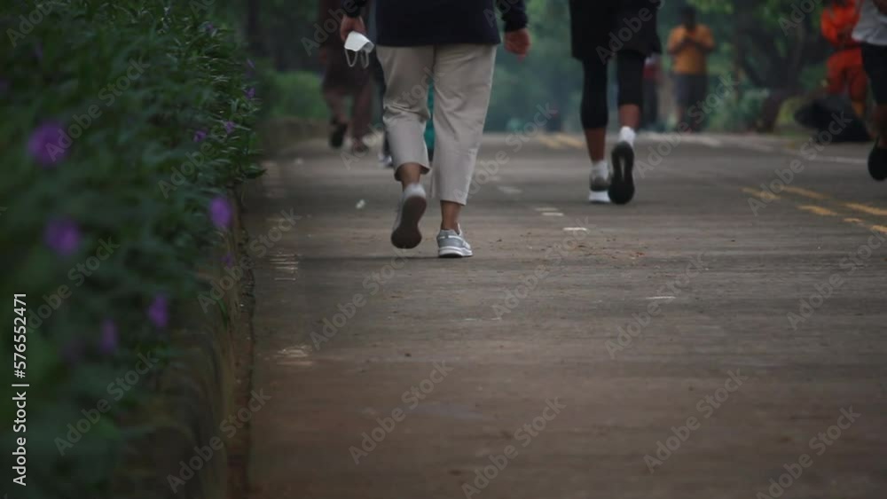 BKT women feet people jogging running BKT women feet people jogging running