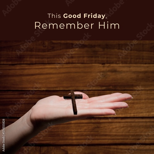 Image of good friday text over hand holding cross