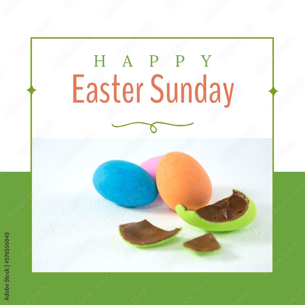 Fototapeta premium Image of happy easter sunday text over chocolate easter eggs