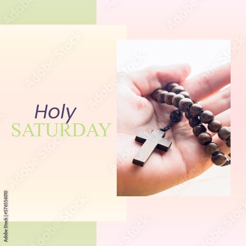 Image of holy saturday text over hands with rosary