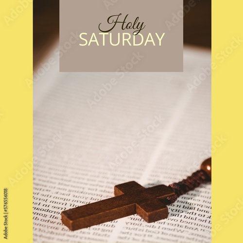 Image of holy saturday text over cross and bible