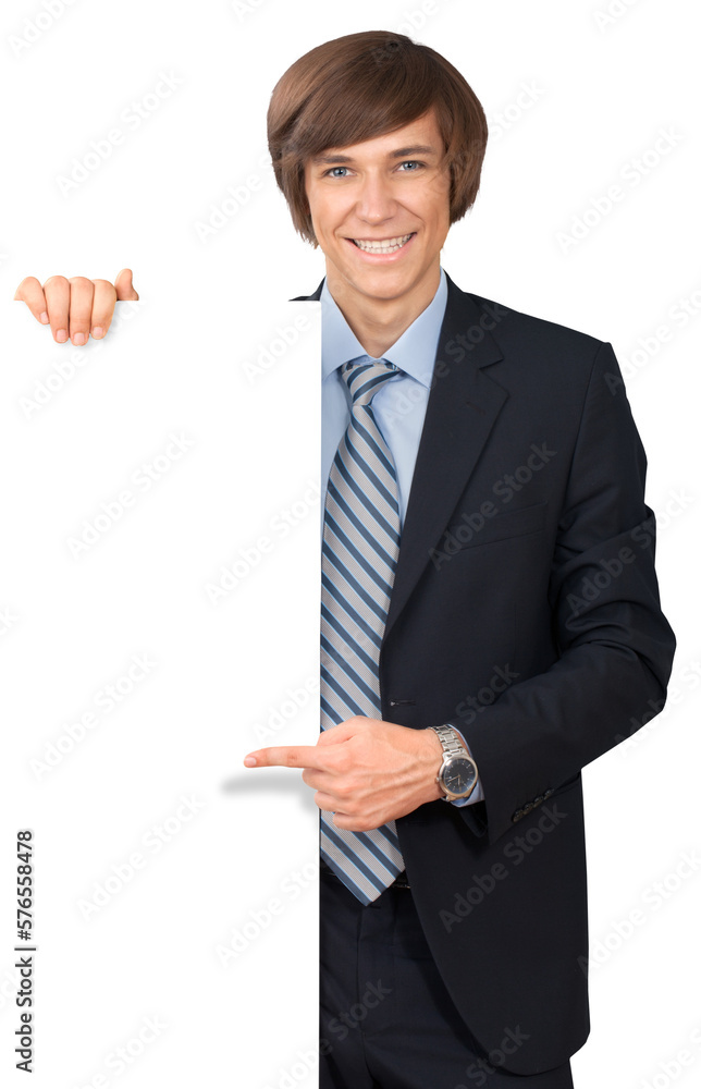 Young male in business suit with invisible object Young male in business suit with invisible object