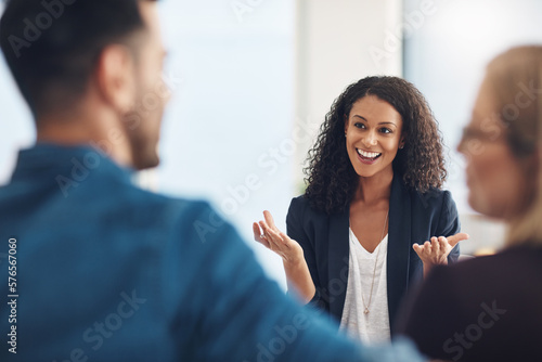 Lessons in love. Shot of a young therapist speaking to a couple during a counseling session.