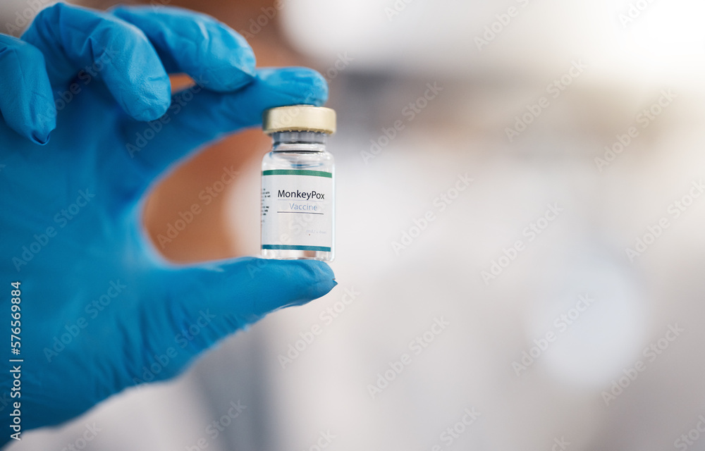 Monkeypox, healthcare and hand of doctor with vaccine development for virus, infection and medicine. Science, pharmaceutical wellness and health worker with vial, bottle and medical care for disease Monkeypox, healthcare and hand of doctor with vaccine development for virus, infection and medicine. Science, pharmaceutical wellness and health worker with vial, bottle and medical care for disease