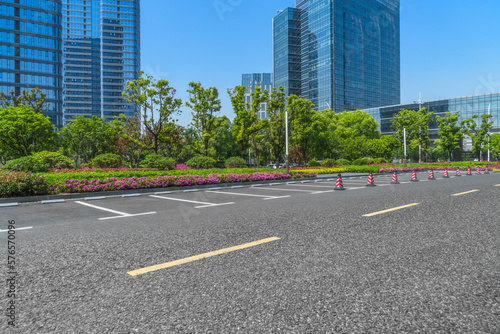 empty asphalt road front of modern buildings © hallojulie