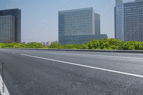 empty road with modern buildings on background  shanghai  china..