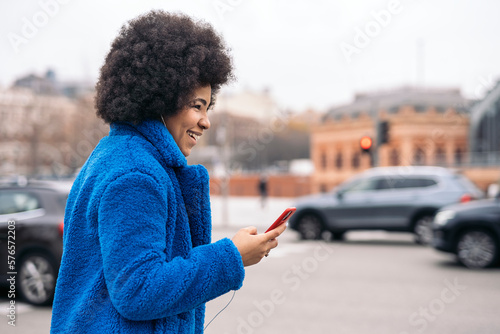 Happy Afro Girl Using Phone