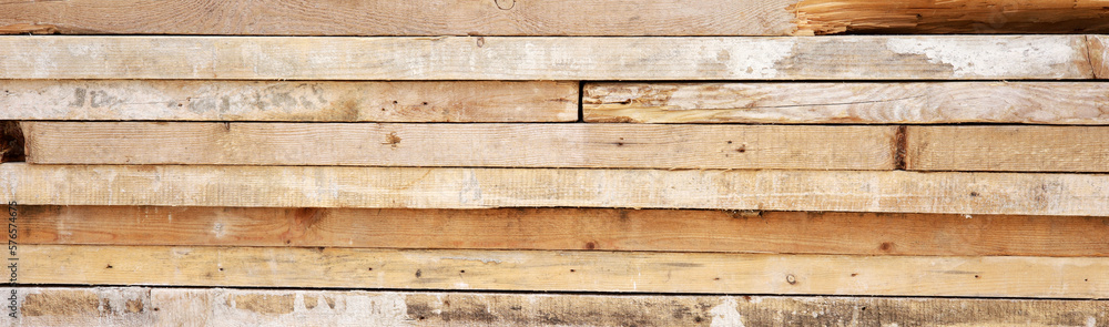 Fototapeta premium wooden background with pile of planks