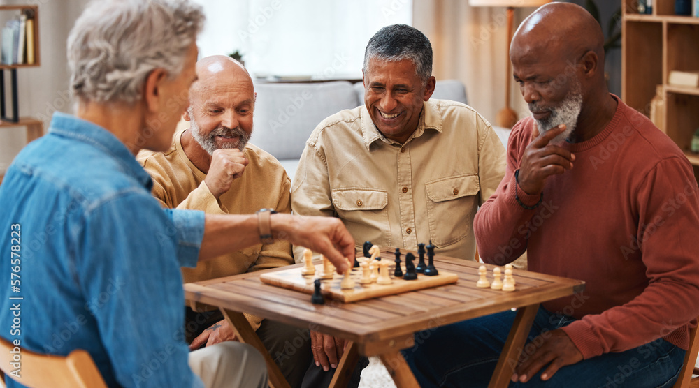 Chess, friends and board games on wooden table thinking of strategic or tactical move at home. Senior group of men playing and holding or moving white piece for attack in game of skill and tactics Chess, friends and board games on wooden table thinking of strategic or tactical move at home. Senior group of men playing and holding or moving white piece for attack in game of skill and tactics