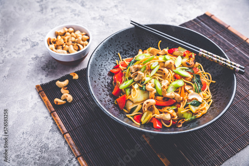 Stir Stir fry noodles with chicken  vegetables and  roasted cashew nuts