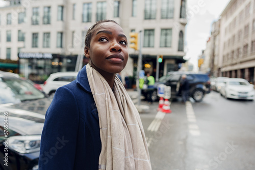 Young urban african woman walking in the city
