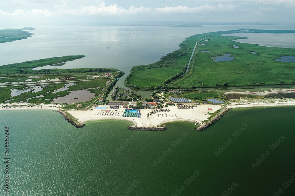 Obraz premium Gura Portitei. Aerial view over Gura Portiei beach resort in Danube Delta, at the Black Sea shore. Landmarks of Romania.