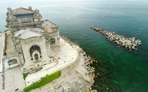 Constanta Cazino landmark building. Aerial view over this iconic architecture construction from Constanta and Black Sea. Travel to Romania. photo