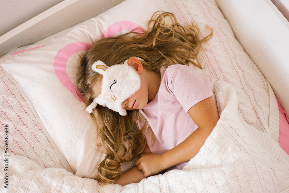 Sweet little kid girl having healthy day nap in bed Sweet little kid girl having healthy day nap in bed