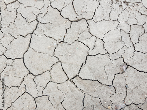 Cracked dry grey dirt background