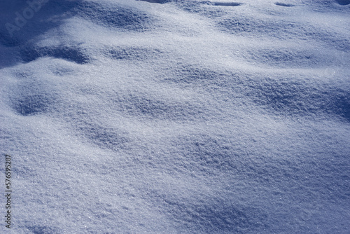 Snowdrift surface at cold winter morning.