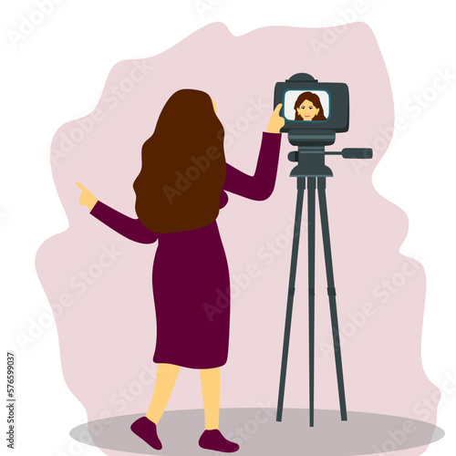 Young girl taking video of herslef on camera, making video content to vlog, concept of Social media, Broadcasting, Technology.