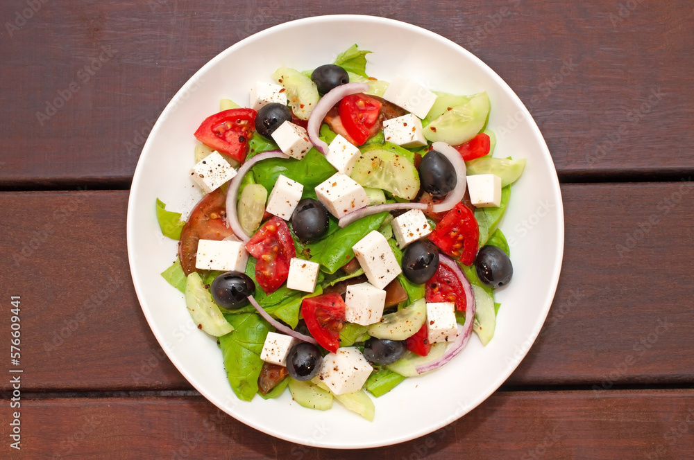 Greek salad with fresh vegetables closeup