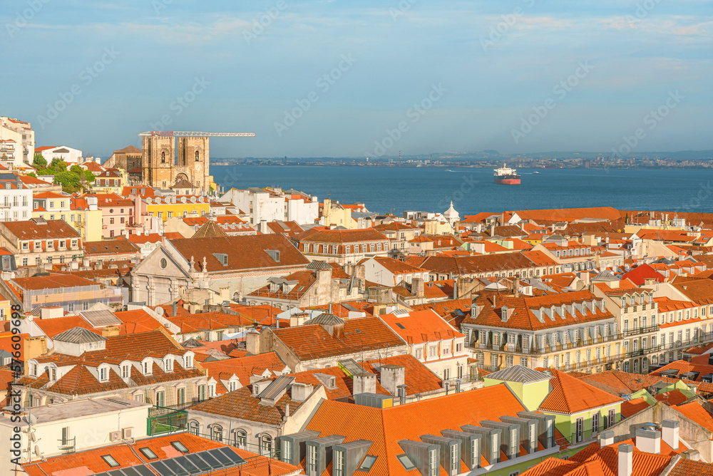 Lisbon, Portugal cityscape skyline of Alfama district with cathedral and Tagus river