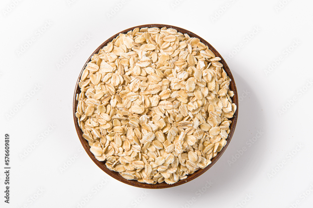 Oat flakes isolated on white background. Oat flakes isolated on white background.