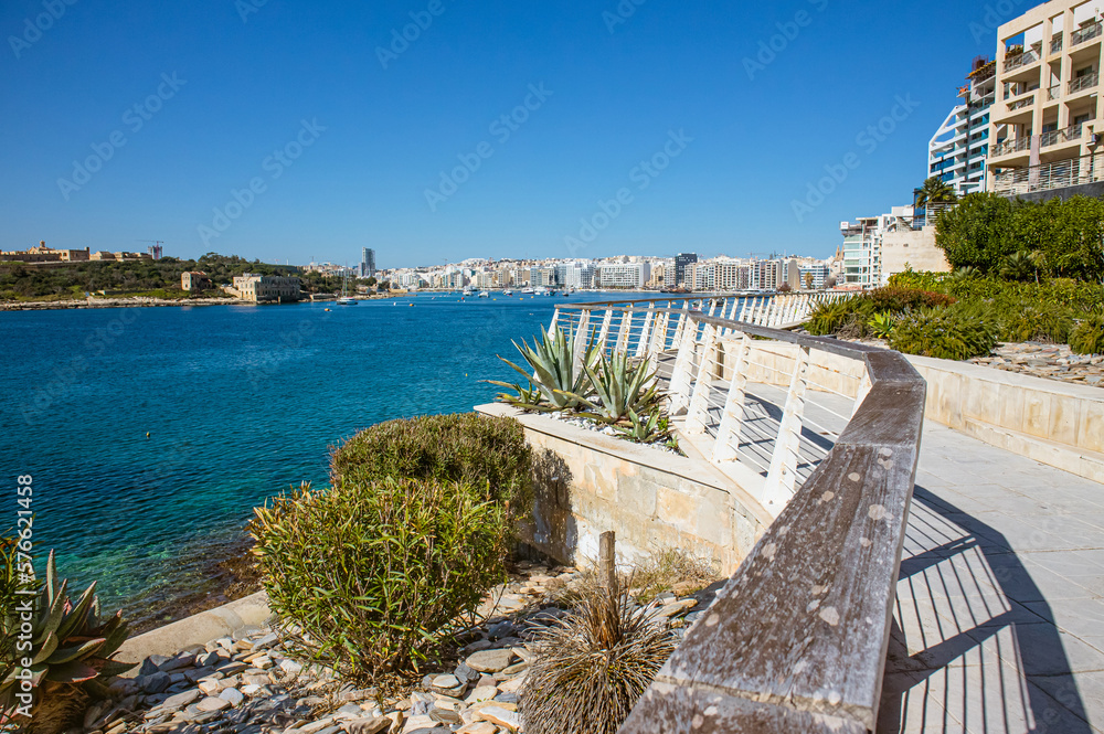 City of Sliema in Malta. Beautiful Sliema bay seen from Tigné point peninsula. Way to Tigne bridge in sunny spring day.