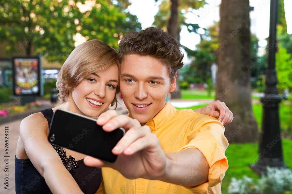 Happy couple do photo, traveling vacation concept Happy couple do photo, traveling vacation concept