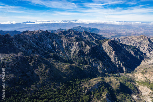 Aerial panoramic view of the mountains and valleys in the Sierra Nevada mountains in Spain