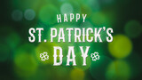 Happy St. Patrick's Day Text Over Green Nature Bokeh Background. Banner for web with Bokeh lights
