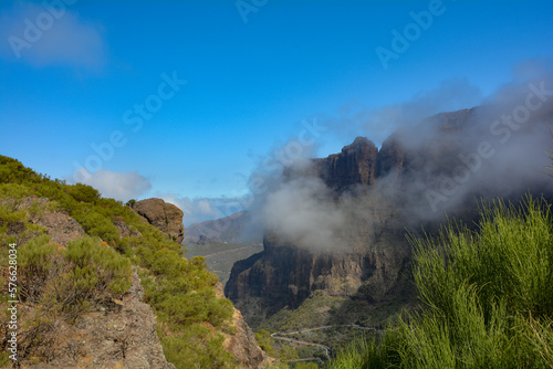 Low hanging clouds in the mountains with road on Tenerife in Spain
