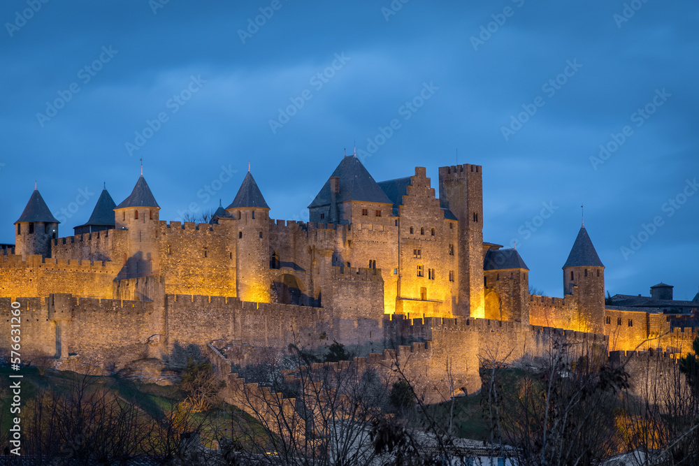 View of Carcassonne medieval fortified town at dusk, Aude, France