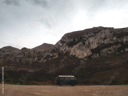 The van is in the wild and rocky coast. © macizogalaico