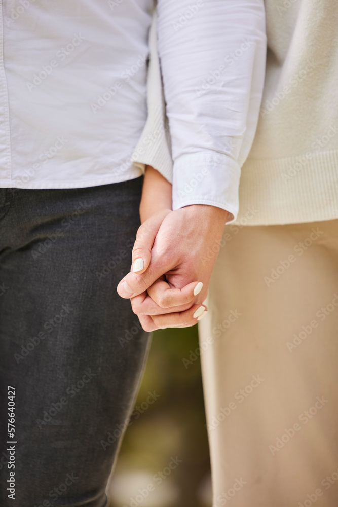 Closeup couple holding hands in park for love, date and marriage commitment together in summer garden. Hand of man, woman and walking outdoor, loyalty and care for partner, trust and calm romance Closeup couple holding hands in park for love, date and marriage commitment together in summer garden. Hand of man, woman and walking outdoor, loyalty and care for partner, trust and calm romance
