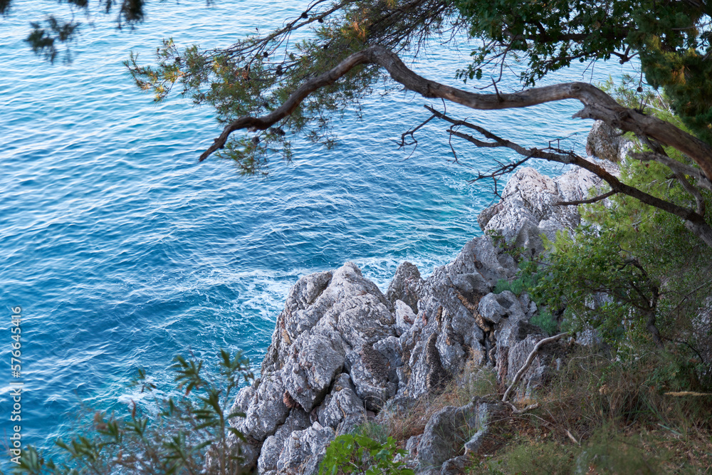 Top view of beautiful blue sea surface and fantastic rocky coast, Montenegro Top view of beautiful blue sea surface and fantastic rocky coast, Montenegro