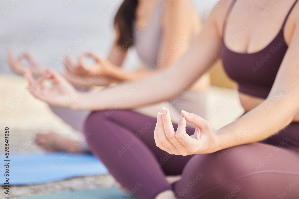 Meditation, lotus hands and women outdoor to exercise in nature for fitness, peace and wellness. Yoga friends on beach ground for workout, training and energy for mental health, chakra and zen time