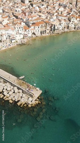 Vertical aerial view of Cefalu old town, a small town along the coast near Palermo, Sicily, Italy. photo